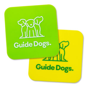 Yellow and a green square with Guide Dogs logo